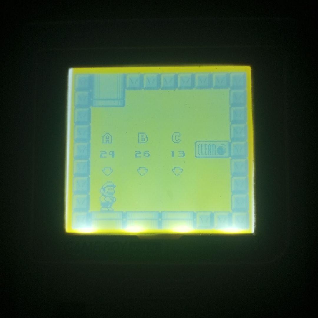 Backlit Game Boy Pocket with Mario and 6 Gold Coins