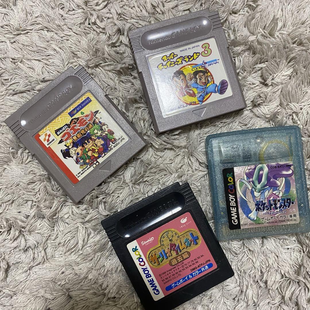 Includes 4 cartridges. Game Boy Color Nintendo