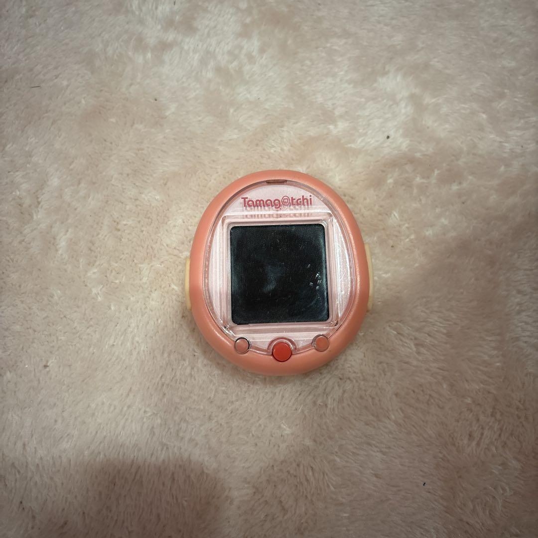 Pink Tamagotchi with Band