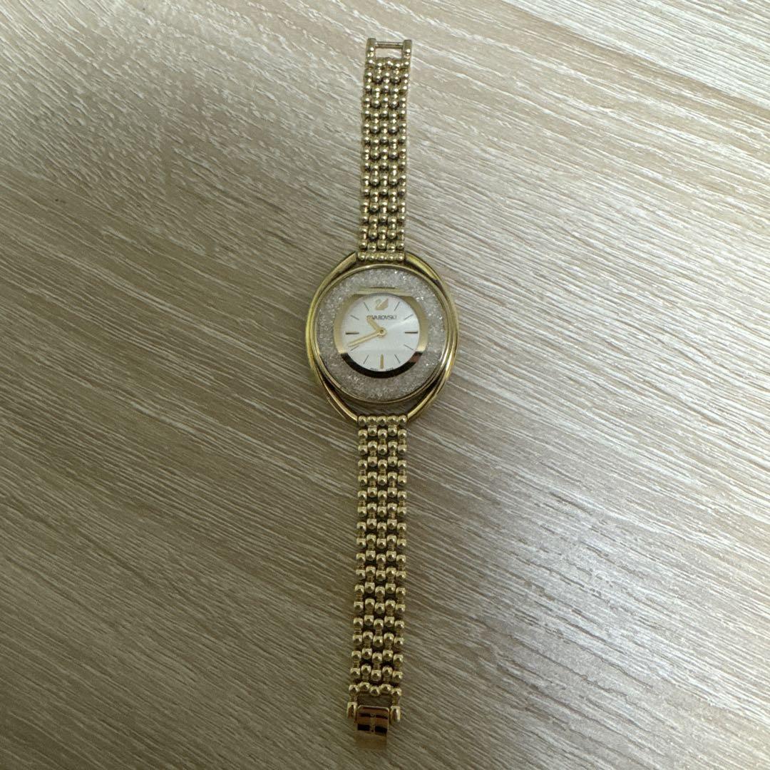 Swarovski Crystal Line Oval Gold Tone Bangle Watch