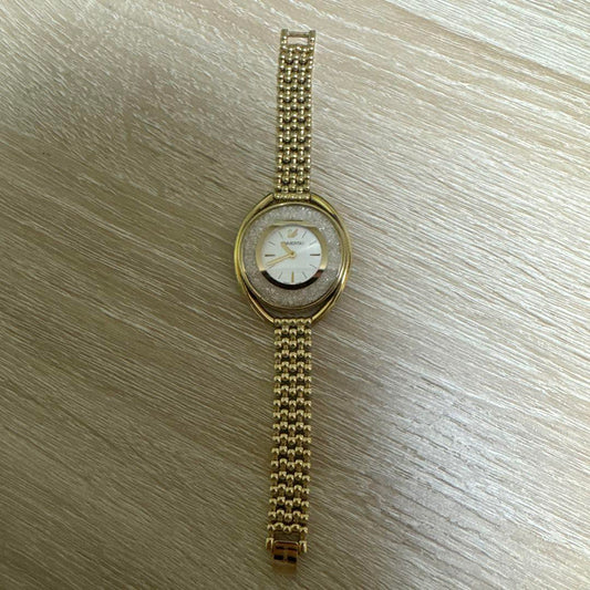 Swarovski Crystal Line Oval Gold Tone Bangle Watch
