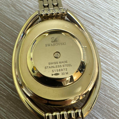 Swarovski Crystal Line Oval Gold Tone Bangle Watch