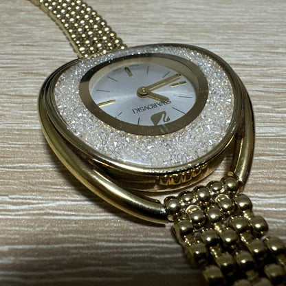 Swarovski Crystal Line Oval Gold Tone Bangle Watch