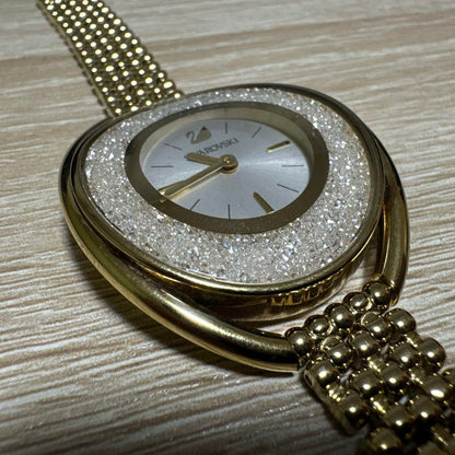 Swarovski Crystal Line Oval Gold Tone Bangle Watch