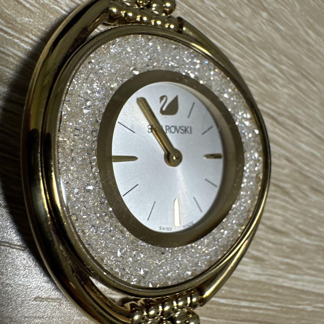 Swarovski Crystal Line Oval Gold Tone Bangle Watch