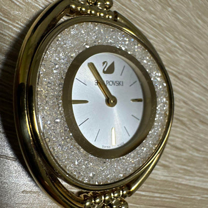 Swarovski Crystal Line Oval Gold Tone Bangle Watch