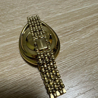 Swarovski Crystal Line Oval Gold Tone Bangle Watch