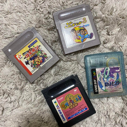 Includes 4 cartridges. Game Boy Color Nintendo