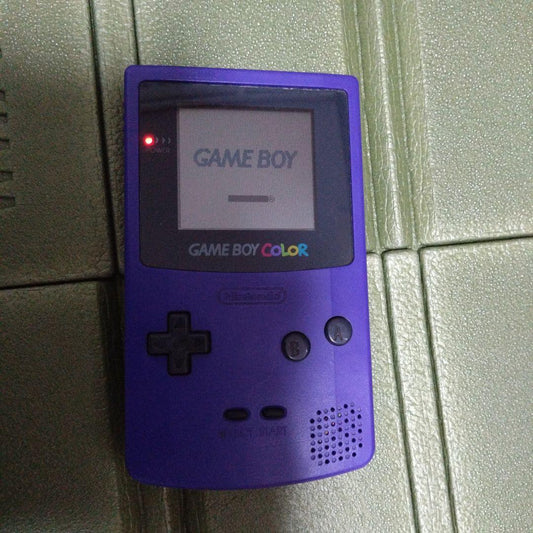 back of a Game Boy Color console with wrinkles on the back tape part
