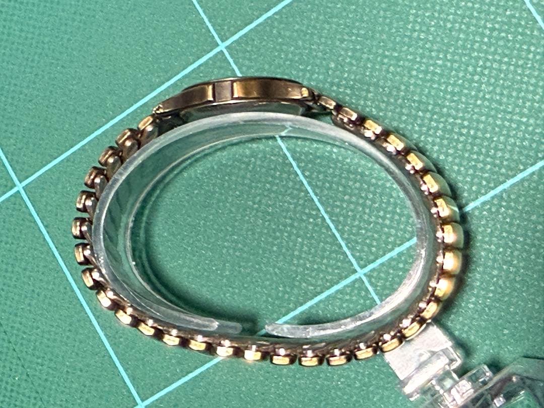 57: Renoma Gold Black Watch