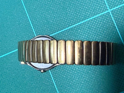 57: Renoma Gold Black Watch