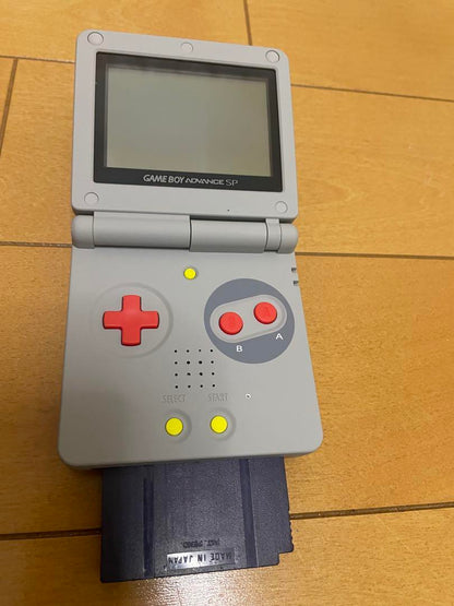 Game Boy Advance SP Console with Cartridge