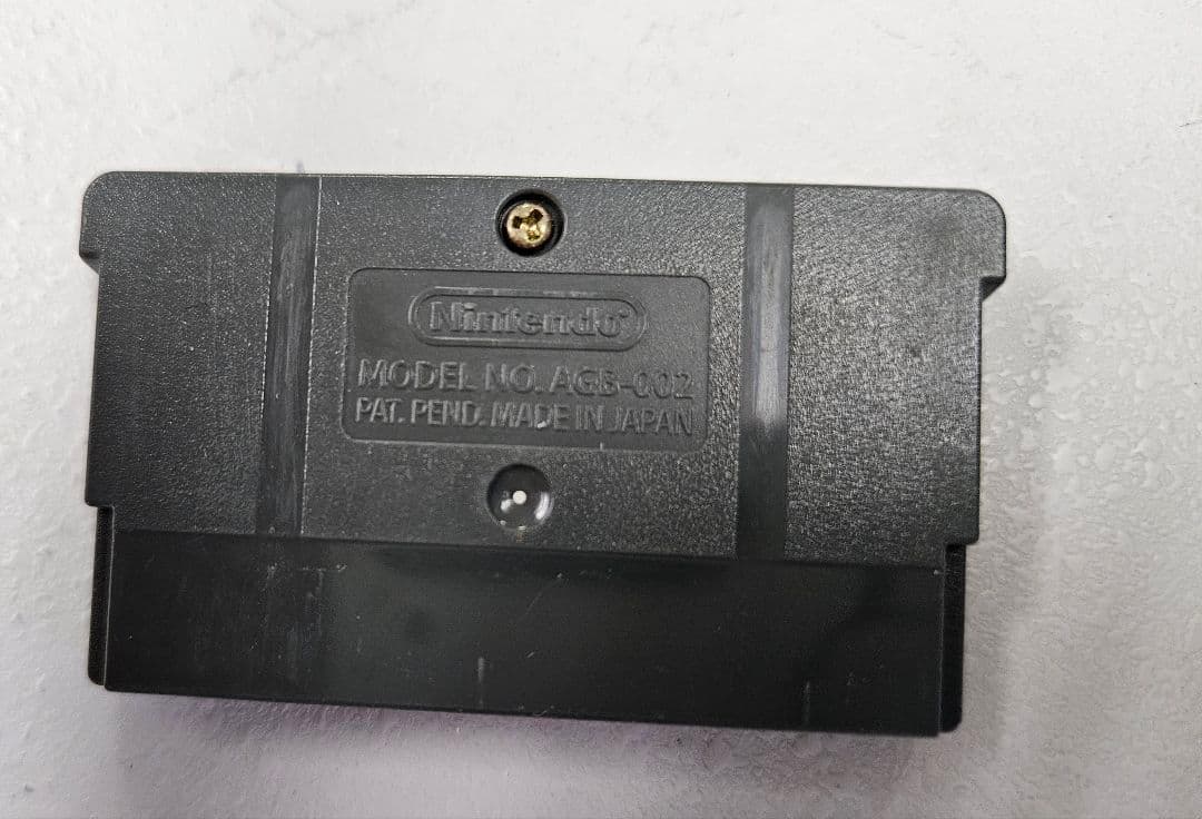 Game Boy Advance SP Black + Charger + Super Mario Advance 4