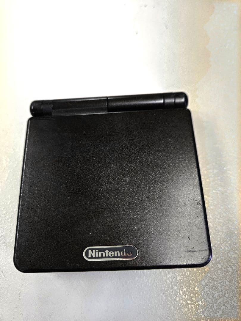 Game Boy Advance SP Black + Charger + Super Mario Advance 4