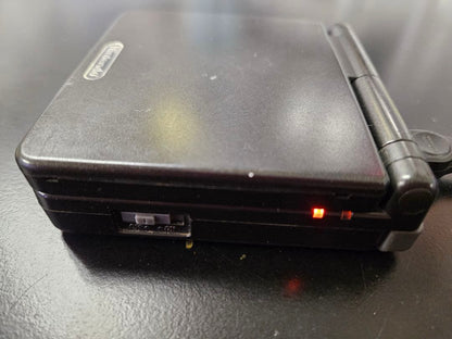 Game Boy Advance SP Black + Charger + Super Mario Advance 4