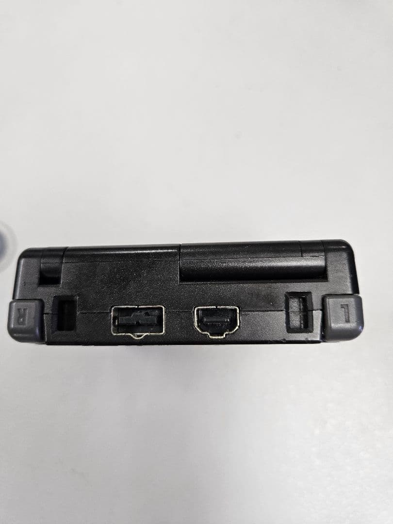 Game Boy Advance SP Black + Charger + Super Mario Advance 4