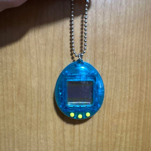Rare First Generation Tamagotchi Blue with Manual