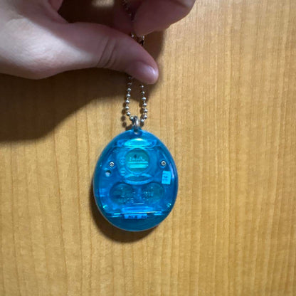 Rare First Generation Tamagotchi Blue with Manual