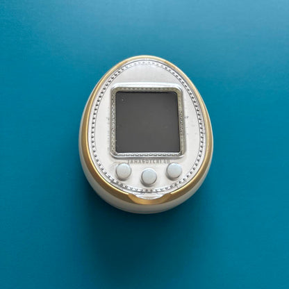 Tamagotchi4u White Gold 2014 Tamagotchi Case Included