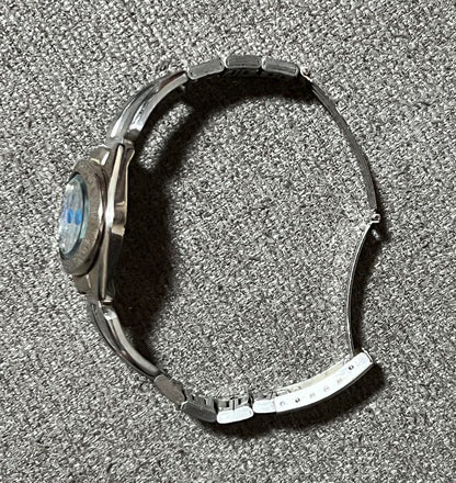 A.K.A. Blue Dial Oval Winding Watch