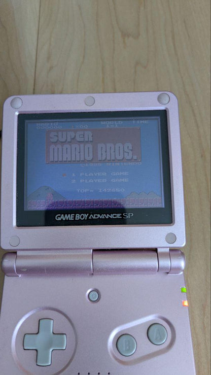 Nintendo Game Boy Advance SP Console and Cartridge and AC Adapter Set