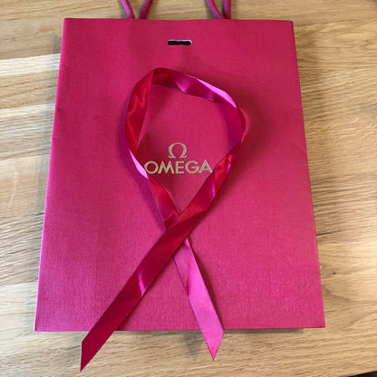 New Unworn OMEGA Cosmetic Case + Paper Bag