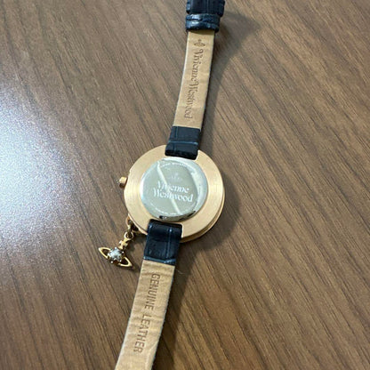 Vivienne Westwood Navy Blue Watch with Saturn Charm