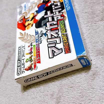 Box with manual, Mario Kart Advance, Game Boy Advance, and others