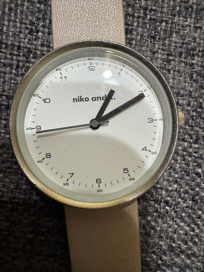 Niko and. White and Beige Timepiece in Excellent Condition, Functionality Confirmed