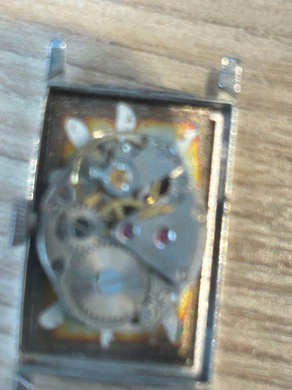 Silver Winding Watch Movement Visible