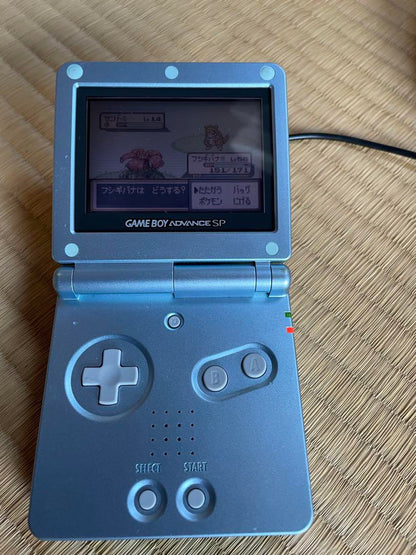 Game Boy Advance SP Pearl Blue + Pokémon Leaf Green (Charger Included)