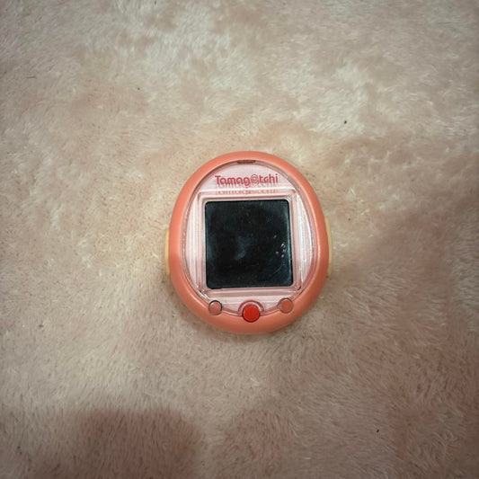 Pink Tamagotchi with Band